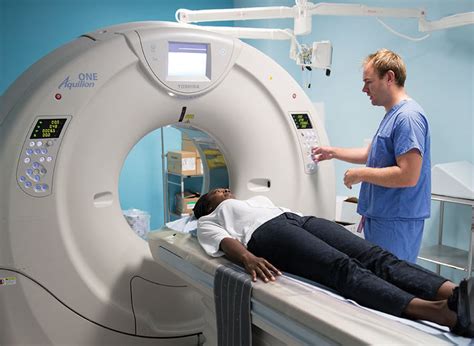 The gantry rapidly rotates around the body in a circular. CT scan - Macmillan Cancer Support