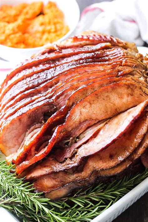 I'm not sure what type of magic happens to the ham in this crock pot, but its seriously incredible! Brown sugar crock pot maple glazed bone in ham cooked with ...