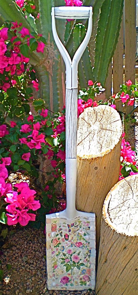 Don't throw away broken garden tools! Old barn shovel repainted and covered in vintage china and ...