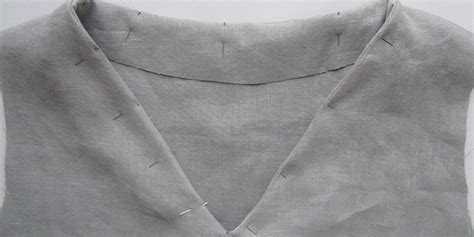This means that when you turn the binding over you will have the wider side of the. Sewing Glossary: How to Sew a Facing to a V-Neckline Tutorial | Sewing, Neckline, Diy clothes