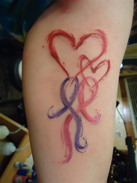 Pink cancer ribbon tattoos can be personalized or plain, stand on their own or blend into a design or larger piece of ink. Cancer Ribbon Tattoos Designs, Ideas and Meaning | Tattoos ...