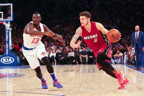 Tyler johnson going up against the brooklyn nets (photo by mike ehrmann/getty images). Should the Miami Heat match Nets' Tyler Johnson offer?