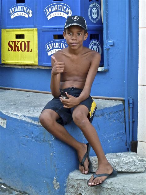 Jacarezinho is a brazilian neighborhood and also a favela with more than 60,300 residents living in an area of 40 ha. Santa Marta favela´s boys | Boy from Santa Marta Favela in ...