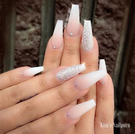 These nails, with their slender look add quite a punch to your nails that you can create ombre patterns with pink and silver glitter, or can also go for marbled look which looks equally stylish. Matte Ombré w Glitter Accent Nail Coffin Shape | Wedding ...