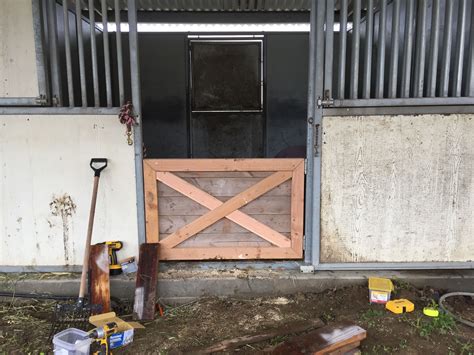 We began with placing one of the 4x6x12s on the ground and ran it from the barn wall to the center support beam. Miniature horse DIY stall door | Horse stalls doors, Diy ...