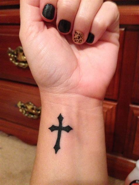 It looks cool much like a trademark and is almost scarcely. Cross Tattoos on Wrist Designs, Ideas and Meaning ...