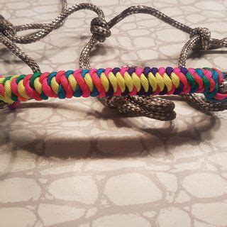 Tuck the working under the anchored end, then back over the anchor. How to Tie a 4 Strand Paracord Braid With a Core and Buckle. | Paracord braids, Paracord ...