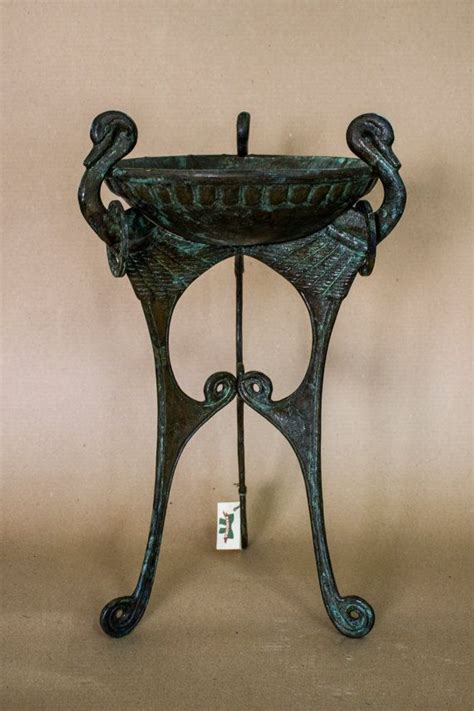 The light of paradise is the light of the righteous people therein. Ancient Metallic Greek Tripod (Delphi Museum) | Ancient ...