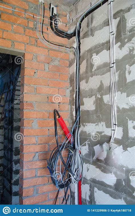 Electrical wires and cable have markings stamped or printed on their insulation or outer sheathing. Installation Of Electrical Wiring In The Room, The Beginning Of Interior Work Stock Photo ...