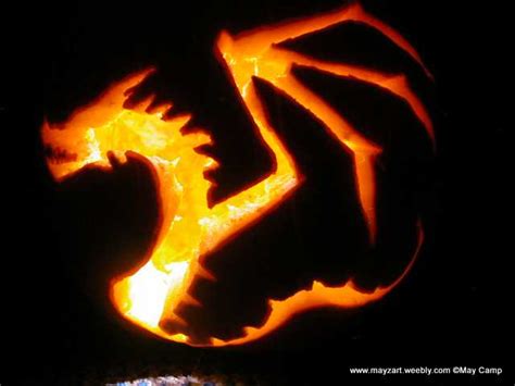 A dragon pumpkin carving i made inspired by team four star and their logo. Pumpkin Carving of Dragon - Mayzart