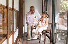 japanese grandfather granddaughter playing