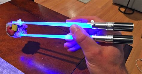 The proper way to use a chopstick is. These Light-Up Lightsaber Chopsticks Are The Only Proper Way For Star Wars Geeks To Eat Sushi