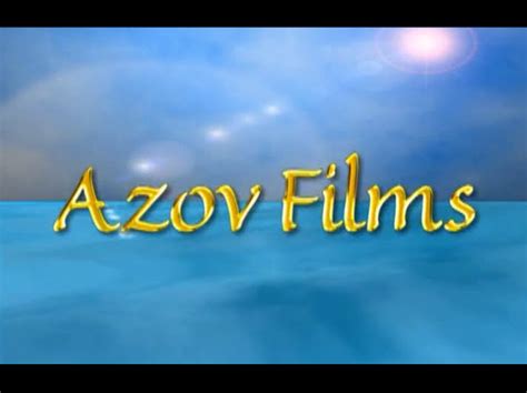 Yellow sand, green sea water and cloudy sky background. Boys Films: Azov Films