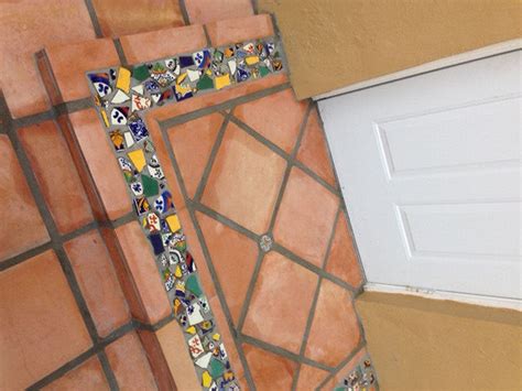 A 1940s home converted into a work of art, mosaic tile house features colored tiles and glass mosaics both on the exterior and interior. Mexican Tile Mosaic at the Main Entrance, Mexican Home ...