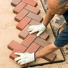 There are brick houses, brick sidewalks, and brick paths that lead to the brick barns. Image result for how to lay a herringbone brick path ...