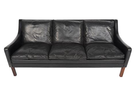 Maybe you would like to learn more about one of these? Danish Modern Black Leather Down Filled Sofa | Chairish