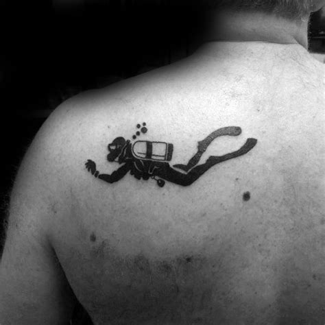 A tattoo with a tree between your shoulder blades. small-simple-mens-upper-back-shoulder-blade-tattoo-with ...