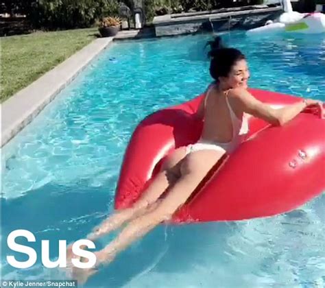 Kylie jenner is getting into the swim of things. Kylie Jenner makes a splash during a pool day shown in ...