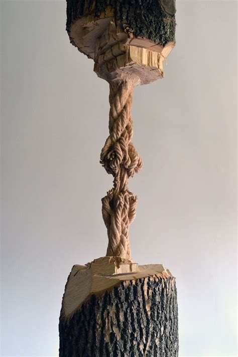 Suspended wood carving created by Maskull Lasserre - Vuing.com