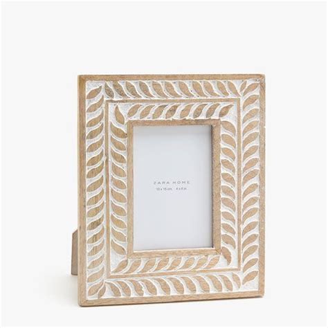 Now, they're leaning into patterned wallpapers, lavish rugs and stacks of coffee table. Image of the product WOODEN FRAME WITH CARVED PETALS | Wall collage decor, Picture frame detail ...