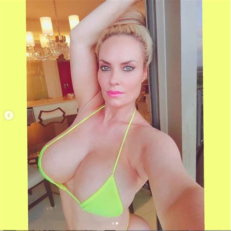 Shoe freak that loves to clean! Reality star Coco Austin flaunts her assets in tiny bikini ...