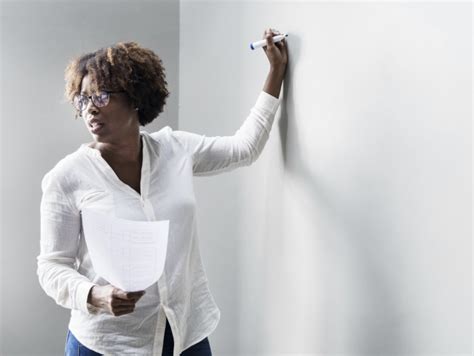 This photo is about table, woman, wood. The Educational Value of a Black Teacher - Ms. Magazine