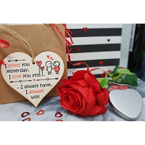 This can be the best gift for girlfriend that touches her heart. The Plum Penguin Handmade Wooden Hanging Heart Plaque ...