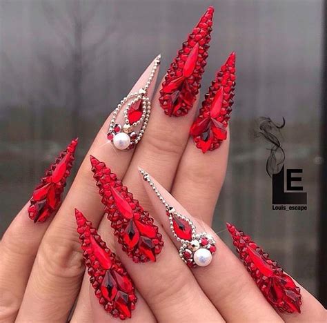 Adding rhinestones to your nails can mean simply adding one stone to each nail. # Red Nails | Stiletto nails designs, Swarovski nails, Red ...