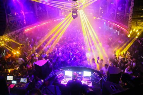 Discotheque meaning, definition, what is discotheque: Crowd in discotheque. Yellow laser party in discotheque ...