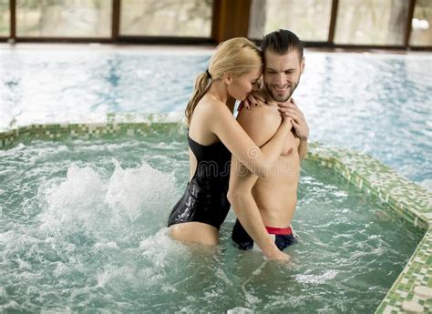 Day spas massage therapists skin care. Loving Couple Relaxing In Hot Tub Stock Image - Image of person, health: 111579639