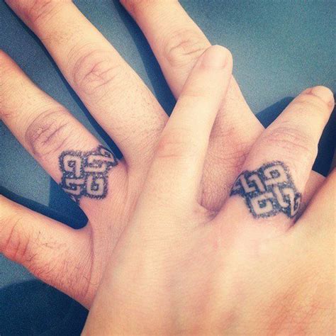 40 mens ring tattoos ranked in order of popularity and relevancy. Wedding Ring Tattoos for Men | Ring tattoo designs ...