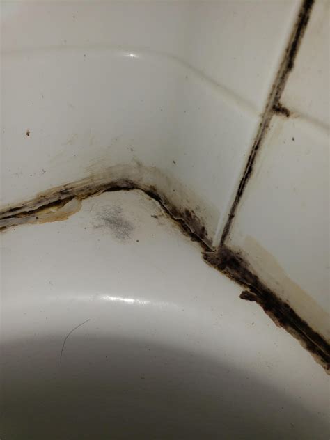 Clean black marks off your porcelain sink with vinegar. Whats the best way to get rid of this (mold) around our ...