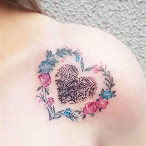 If you want to dedicate a memorial tattoo to your grandfather or grandmother then you should probably get the materialistic stuff inked that your. Fingerprint flowers in 2020 | Fingerprint tattoos ...