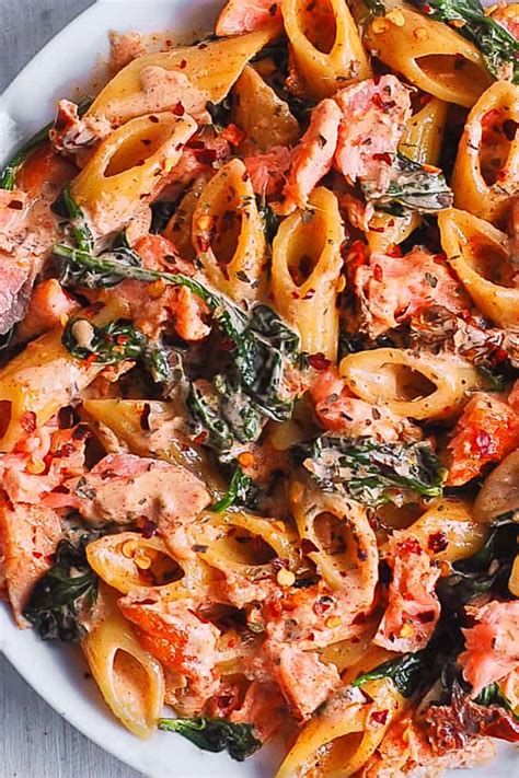Meanwhile, heat olive oil and tomato paste over medium heat for one minute. Salmon Pasta with Sun-Dried Tomato Cream Sauce and Spinach ...