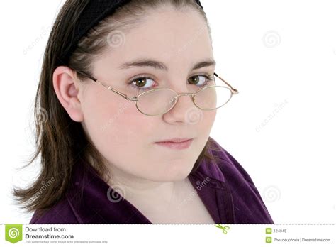 The age where they are in between growing up to a beautiful teenager, yet with the innocence and cuteness in them. Beautiful Thirteen Year Old With Glasses Close-Up Royalty Free Stock Photo - Image: 124045